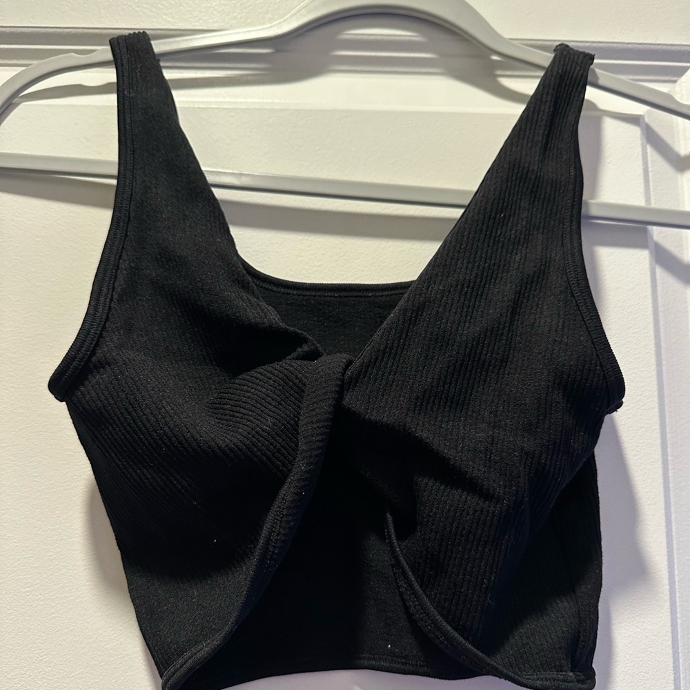 Black crisscross tank top